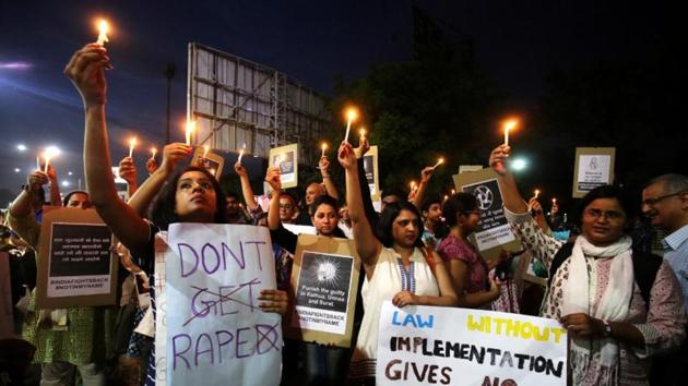 People take out a protest against the rise in crimes against women in Ahmedabad last month. (Reuters File) People take out a protest against the rise in crimes against women in Ahmedabad last month. (Reuters File)