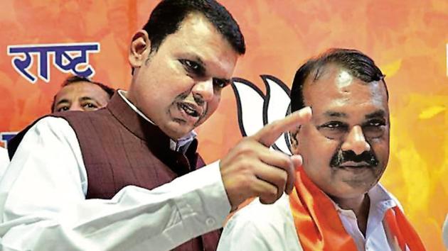 Former Congress leader Rajendra Dhedya Gavit (right) from Palghar joined the BJP on Tuesday. (Anshuman Poyrekar/HT file) Former Congress leader Rajendra Dhedya Gavit (right) from Palghar joined the BJP on Tuesday. (Anshuman Poyrekar/HT file)