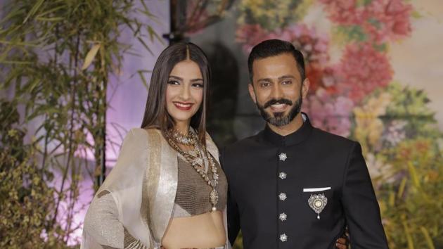 Sonam Kapoor and Anand Ahuja at their wedding reception in Mumbai on Tuesday.(Viral Bhayani)