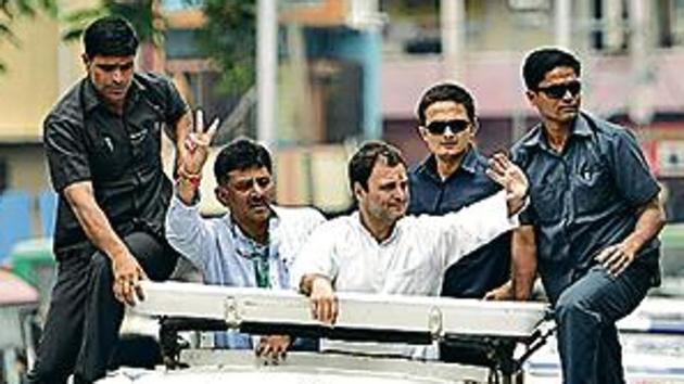 Congress president Rahul Gandhi during a road show in southern Bengaluru on Wednesday.(Arijit Sen/HT Photo) Congress president Rahul Gandhi during a road show in southern Bengaluru on Wednesday.(Arijit Sen/HT Photo)