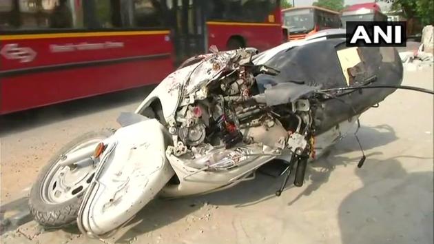 The mangled remains of the scooter that was crushed by a bus killing the rider.(ANI photo)