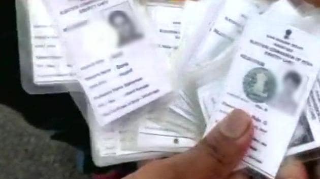 Huge number of voter ID cards found at an apartment in Jalahalli area.(ANI Photo)