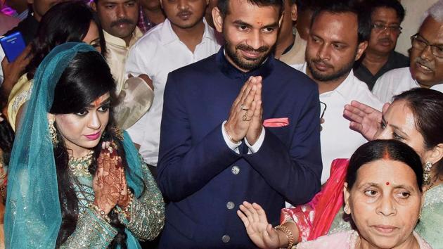 Rashtriya Janata Dal (RJD) chief Lalu Prasad Yadav's elder son Tej Pratap Yadav with fiancee Aishwarya Rai during their engagement function in April at Patna. Jailed RJD chief Lalu Prasad on Wednesday secured five days parole to attend his elder son’s marriage in Patna on May 12. The parole was granted following consultations between the jail administration and the home department. (PTI File) Rashtriya Janata Dal (RJD) chief Lalu Prasad Yadav's elder son Tej Pratap Yadav with fiancee Aishwarya Rai during their engagement function in April at Patna. Jailed RJD chief Lalu Prasad on Wednesday secured five days parole to attend his elder son’s marriage in Patna on May 12. The parole was granted following consultations between the jail administration and the home department. (PTI File)