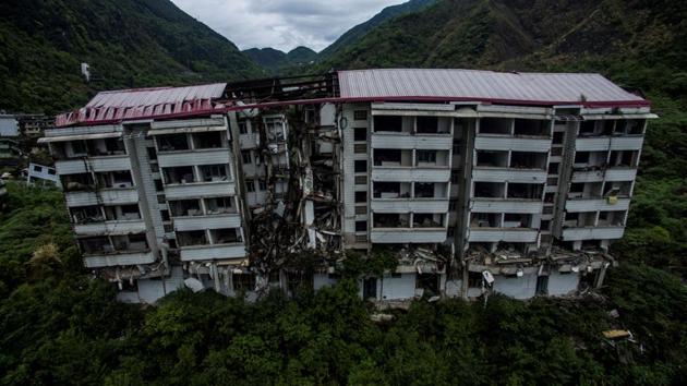 In addition to the emotional challenges, Beichuan’s preservation has faced financial and technical obstacles. “The main difficulty we’re facing is a financial problem,” Chen said, adding that rain, wind and corrosion could eventually lead to the complete collapse of many buildings. The project is the largest of its kind, Chen said, and the city spends over 20 million yuan ($3.1 million) a year on its upkeep. (Johannes Eisele / AFP) In addition to the emotional challenges, Beichuan’s preservation has faced financial and technical obstacles. “The main difficulty we’re facing is a financial problem,” Chen said, adding that rain, wind and corrosion could eventually lead to the complete collapse of many buildings. The project is the largest of its kind, Chen said, and the city spends over 20 million yuan ($3.1 million) a year on its upkeep. (Johannes Eisele / AFP)