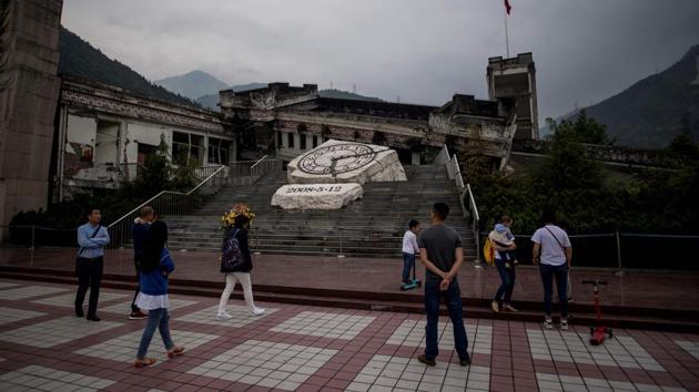 Since 2008, tourism has become the region’s largest industry with restaurants and hotels cashing in on the daily caravans of tour buses. Visitors tour the ruins -- there are no fees for entrance or guides -- and a nearby memorial hall, before heading to new Beichuan. The city and its residents are largely dependent on tourism, although speciality crops, such as cherries, have become an important business. (Johannes Eisele / AFP) Since 2008, tourism has become the region’s largest industry with restaurants and hotels cashing in on the daily caravans of tour buses. Visitors tour the ruins -- there are no fees for entrance or guides -- and a nearby memorial hall, before heading to new Beichuan. The city and its residents are largely dependent on tourism, although speciality crops, such as cherries, have become an important business. (Johannes Eisele / AFP)