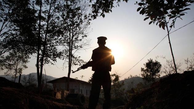 A Kachin rebel stands facing no man’s land outside the armed group’s headquarters in Kachin state. The onslaught is part of a decades-long government campaign to defeat Kachin rebels fighting for greater autonomy for the largely Christian minority group. The intensified offensive has renewed accusations that the army is creating a similar humanitarian crisis to the one spawned by its violence against Rohingya in the country’s west. (Esther Htusan / AP File)