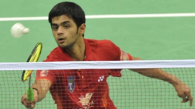 New Delhi 14 August 2013_ B Sai Praneeth (Delhi) in action against Tin Minh Nyugen (Pune) in the first day first show for the Indian Badminton League (IBL) at Sirifort Indoor Stadium in New Delhi on Wednesday 14 August 2013. ( Photo by Vipin Kumar/Hindustan Times)(HT Photo)