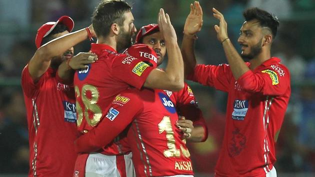 Andrew Tye of the Kings XI Punjab celebrates with teammates after taking the wicket of Ajinkya Rahane (unseen) of the Rajasthan Royals. (BCCI) 