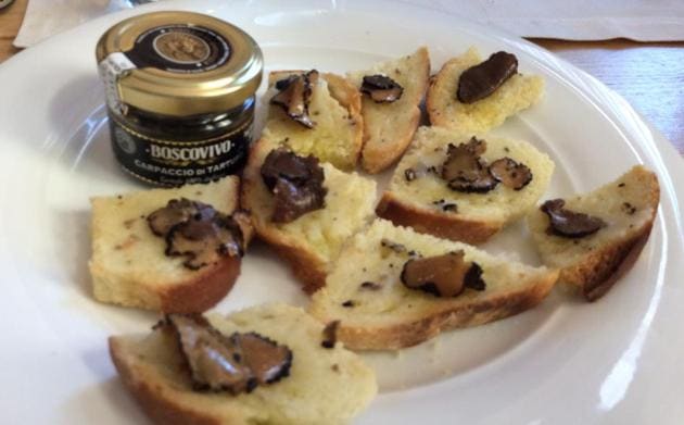 Truffle carpaccio is slices of truffle in olive oil and tastes excellent with toasted bread