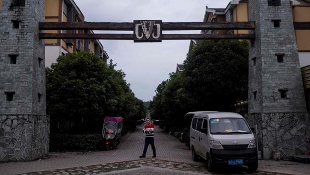 A view of a residential area in "new" Beichuan. Chen, along with many of Beichuan’s original residents moved here in the years after the earthquake, purchasing homes in neat apartment complexes built with government assistance. Some locals complain that visitors have declined in recent years, fretting about how they will survive in 10 or 20 years, when interest in the disaster inevitably wanes. (Johannes Eisele / AFP) A view of a residential area in "new" Beichuan. Chen, along with many of Beichuan’s original residents moved here in the years after the earthquake, purchasing homes in neat apartment complexes built with government assistance. Some locals complain that visitors have declined in recent years, fretting about how they will survive in 10 or 20 years, when interest in the disaster inevitably wanes. (Johannes Eisele / AFP)