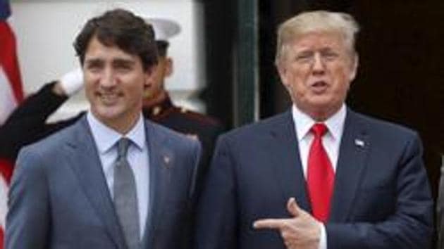 US President Donald Trump and first lady Melania Trump welcome Canadian Prime Minister Justin Trudeau and his wife Sophie Gregoire Trudeau to the White House in Washington, October 11, 2017. (AP) US President Donald Trump and first lady Melania Trump welcome Canadian Prime Minister Justin Trudeau and his wife Sophie Gregoire Trudeau to the White House in Washington, October 11, 2017. (AP)