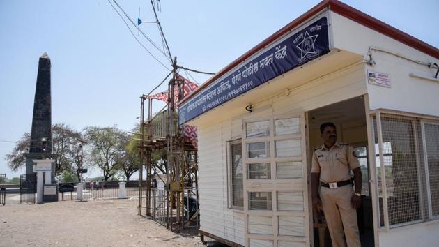 A police official at the chowki that was build near the Vijay Stambh (victory memorial) in Bhima Koregaon after the caste violence that took place on January 1, 2018. (SANKET WANKHADE/HT PHOTO)