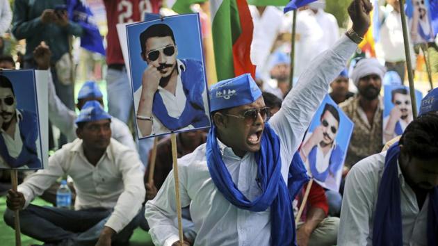 Supporters of Dalit outfit Bhim Army have blamed Rajputs for the death of its Saharanpur district president Kamal Walia’s brother Sachin Walia who was found shot on Wednesday afternoon. The suspicious death has spurred fears of a repeat of last year’s inter-caste clashes in the district after a dispute arose over loud music being played during a Maharana Pratap Jayanti procession. (Altaf Qadri / AP File)