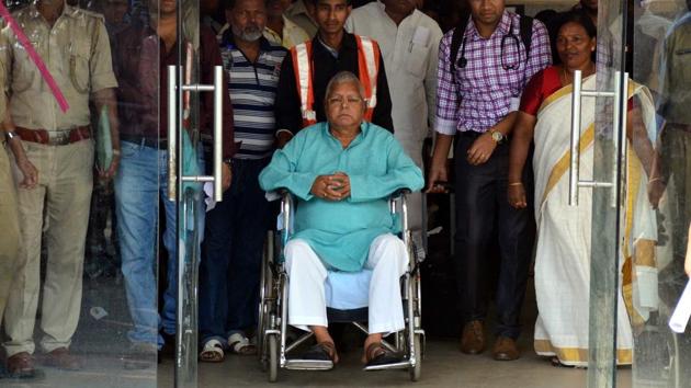 RJD chief Lalu Prasad, who is serving his sentence following a conviction in fodder scam cases, was on Thursday granted three days parole to attend his son’s wedding in Patna, Inspector General of Prison Harsh Mangla said on Thursday. However, the IG Prison was not categorical about the effective date of parole and said it depended upon when the jail authorities would release him. (Hardeep Singh / HT Photo)