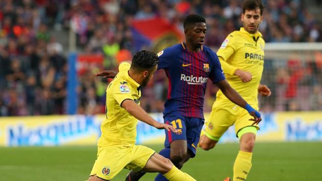 Barcelona extended their unbeaten La Liga run to 36 games with a 5-1 win over Villareal at the Nou Camp on Wednesday, with Ousmane Dembele (C) soring twice.(REUTERS)