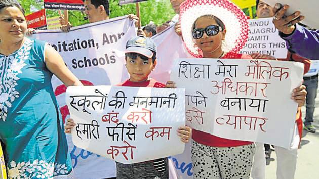 Children ,Parents and members of Haryana Parents forum for education protesting against fee hike in private schools at Jantar Mantar in New Delhi. (HT File Photo) Children ,Parents and members of Haryana Parents forum for education protesting against fee hike in private schools at Jantar Mantar in New Delhi. (HT File Photo)