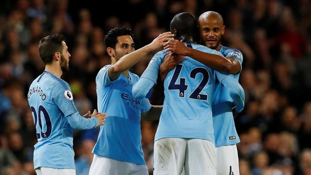 Manchester City said a fond Etihad farewell to Yaya Toure (2R), routing Brighton & Hove Albion 3-1 and moving on to 97 points -- the most ever in a Premier League season.(REUTERS)