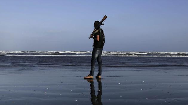 Mohammed Abu Hassan, 30, who fought during the ‘2015 battle of Aden’ holds his rifle on a beach in Aden. “Enough violence, I hate it. Aden now is full of militias. Everyone is killing everyone. What did we gain out of all this? Nothing... This is not for God. This is all about people’s selfish interest,” he said. (Nariman El-Mofty / AP) 