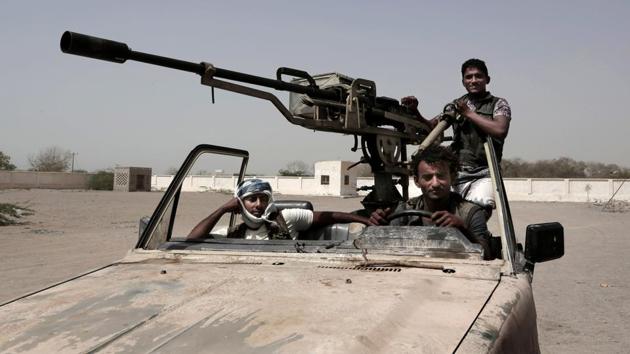 Young Saudi-led coalition backed forces patrol al-Khoukha. Fighters on all sides are often minors, some as young as 12 are dragged into what many see as a cynical fight between Iranian-backed Houthi rebels and a US-backed coalition led by Saudi Arabia nominally supporting the government. (Nariman El-Mofty / AP) 