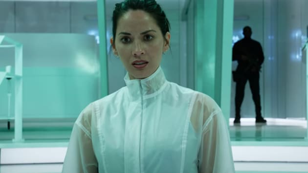 Olivia Munn stars as a scientist who must help elite soldiers against the Predators.