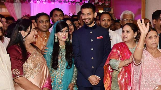 Tej Pratap with fiancee Aishwarya Rai, granddaughter of former Bihar chief minister Daroga Prasad Rai, during their engagement function in Patna.(PTI File Photo)