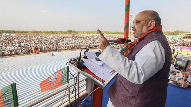 BJP National President Amit Shah addresses the OBC Convention during his fifth round of campaigning in Kaginele, Karnataka on April 03, 2018. Speaking at the convention, Shah promised to ensure the passage of the bill granting constitutional status to the National Commission for Backward Classes in Parliament. (PTI) BJP National President Amit Shah addresses the OBC Convention during his fifth round of campaigning in Kaginele, Karnataka on April 03, 2018. Speaking at the convention, Shah promised to ensure the passage of the bill granting constitutional status to the National Commission for Backward Classes in Parliament. (PTI)