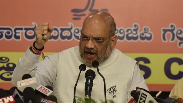 BJP president Amit Shah speaks to media during a BJP press conference on the last day of campaigning elections.(Arijit Sen/HT Photo)