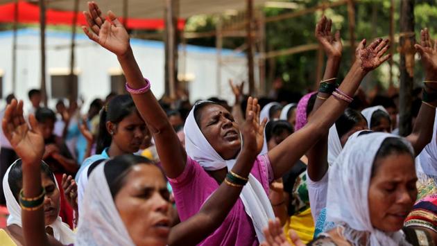 Women chant hymns during a sit-in rally in support of various demands including reservation in government jobs for Christians, in Mumbai on May 09, 2018. (Francis Mascarenhas / REUTERS) Women chant hymns during a sit-in rally in support of various demands including reservation in government jobs for Christians, in Mumbai on May 09, 2018. (Francis Mascarenhas / REUTERS)