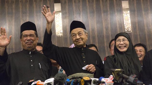 Mahathir, waves after becoming Malaysia’s Prime Minister on May 10, 2018. He is now the world’s oldest elected leader and, analysts say, seems intent on cleaning up Malaysia — calling it a “mess” — and fashioning a more positive legacy. He has promised to seek a full royal pardon for Anwar, criticized a repressive “fake news” law introduced under Najib and vowed to cancel an unpopular goods and service tax. (Ore Huiying / Bloomberg)