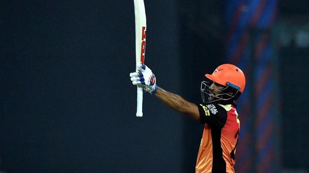 Shikhar Dhawan raises his bat after scoring a fifty. (PTI) Shikhar Dhawan raises his bat after scoring a fifty. (PTI)
