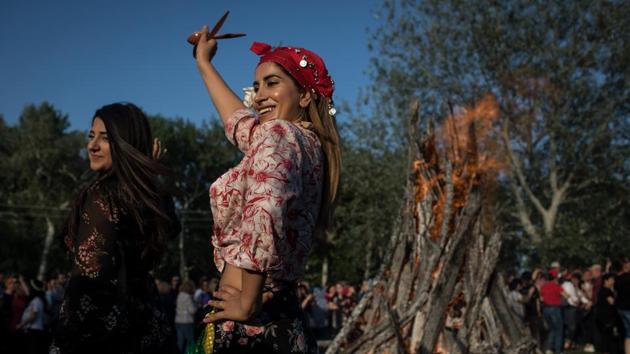 Women dance in front of a large bonfire during the Kakava Festival in Edirne, Turkey celebrating the coming of spring amongst the Roma community. (Chris McGrath / Getty Images) Women dance in front of a large bonfire during the Kakava Festival in Edirne, Turkey celebrating the coming of spring amongst the Roma community. (Chris McGrath / Getty Images)