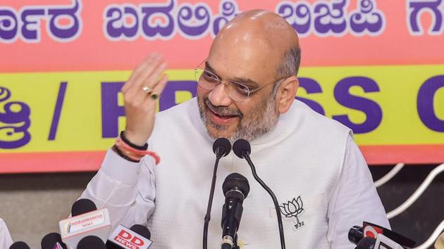 BJP National President Amit Shah addresses a press conference in Bengaluru on May 10, 2018. As the campaign came to a close, Shah said his party will win at least 130 seats in the May 12 elections and that BS Yeddyurappa will be the next chief minister of the state. (PTI) BJP National President Amit Shah addresses a press conference in Bengaluru on May 10, 2018. As the campaign came to a close, Shah said his party will win at least 130 seats in the May 12 elections and that BS Yeddyurappa will be the next chief minister of the state. (PTI)