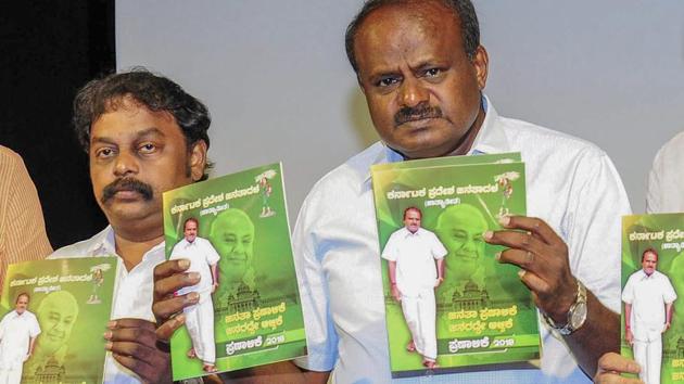 Janata Dal (Secular) President H D Kumaraswamy releases his party manifesto, in the presence of other party leaders, ahead of the Karnataka assembly elections 2018 in Bengaluru on May 07, 2018. (PTI) Janata Dal (Secular) President H D Kumaraswamy releases his party manifesto, in the presence of other party leaders, ahead of the Karnataka assembly elections 2018 in Bengaluru on May 07, 2018. (PTI)