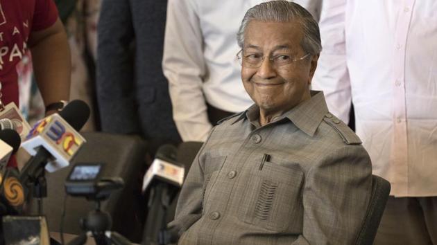Mahathir Mohamad smiles during a press conference in Kuala Lumpur, Malaysia on May 10, 2018. Known as an authoritarian leader who persecuted his foes and stifled dissent, the pugnacious politician, remarkably robust at age 92, pulled off a stunning electoral upset on Wednesday, denying his former protege Najib Razak a third term as Prime Minister, ending the ruling National Front’s 60-year hold on power. (Adrian Hoe / AP)