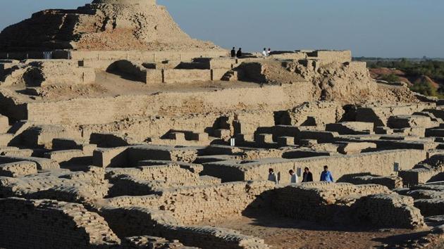 Visitors walk through the archaeological site of Mohenjo Daro, one of the world's earliest cities and a Bronze Age metropolis, near present-day Karachi.(AFP File Photo/Representative image)