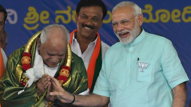 Prime Minister Narendra Modi and BJP's chief ministerial candidate BS Yeddyurappa share a laugh during their Karnataka election campaign rally at Chamarajanagar on May 01, 2018. Speaking at the rally, Modi said, “ BS Yeddyurappa is the hope of the people of Karnataka and he is going to be the next chief minister of the state.” (PTI) Prime Minister Narendra Modi and BJP's chief ministerial candidate BS Yeddyurappa share a laugh during their Karnataka election campaign rally at Chamarajanagar on May 01, 2018. Speaking at the rally, Modi said, “ BS Yeddyurappa is the hope of the people of Karnataka and he is going to be the next chief minister of the state.” (PTI)