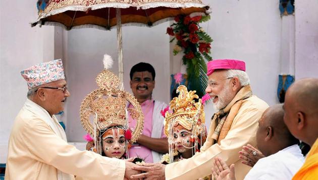 Prime Minister Narendra Modi greets Nepalese Prime Minister Khadga Prasad Oli during his visit to the Janaki temple in Janakpur, Nepal on Friday. Nepal is at the top of India’s Neighbourhood First policy, Modi said on Friday as he announced a grant of ₹100 crores to develop the sacred city of Janakpur and its surrounding areas. (PTI) Prime Minister Narendra Modi greets Nepalese Prime Minister Khadga Prasad Oli during his visit to the Janaki temple in Janakpur, Nepal on Friday. Nepal is at the top of India’s Neighbourhood First policy, Modi said on Friday as he announced a grant of ₹100 crores to develop the sacred city of Janakpur and its surrounding areas. (PTI)