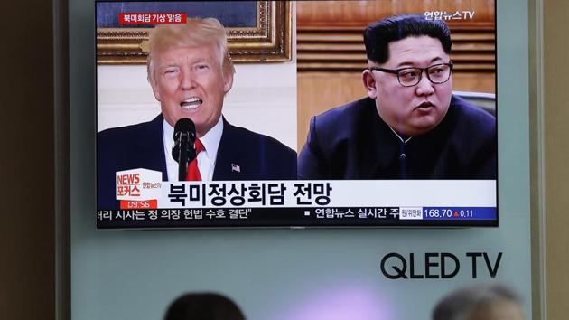 People watch a TV screen showing file footage of US President Donald Trump and North Korean leader Kim Jong Un during a news program at the Seoul Railway Station in Seoul, South Korea. (AP Photo) People watch a TV screen showing file footage of US President Donald Trump and North Korean leader Kim Jong Un during a news program at the Seoul Railway Station in Seoul, South Korea. (AP Photo)