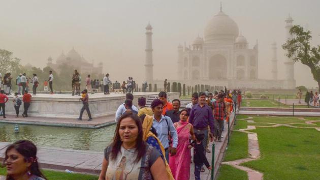 Visitors seen at the Taj Mahal in Agra on May 09, 2018. The Supreme Court on Wednesday came down heavily on the Archaeological Survey of India for its failure to take appropriate steps to protect and preserve the iconic monument. (PTI) Visitors seen at the Taj Mahal in Agra on May 09, 2018. The Supreme Court on Wednesday came down heavily on the Archaeological Survey of India for its failure to take appropriate steps to protect and preserve the iconic monument. (PTI)
