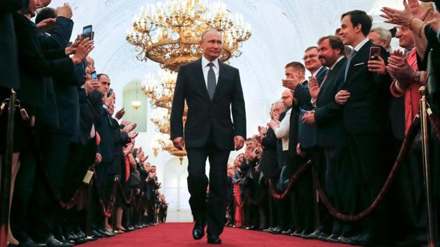 Russian president-elect Vladimir Putin walks prior to his inauguration ceremony at the Kremlin in Moscow, Russia. (Alexander Zemlianichenko / AFP) Russian president-elect Vladimir Putin walks prior to his inauguration ceremony at the Kremlin in Moscow, Russia. (Alexander Zemlianichenko / AFP)
