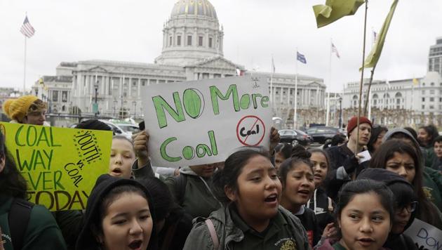 Students yell and hold up signs at a rally for clean energy in San Francisco. (AP Photo) Students yell and hold up signs at a rally for clean energy in San Francisco. (AP Photo)