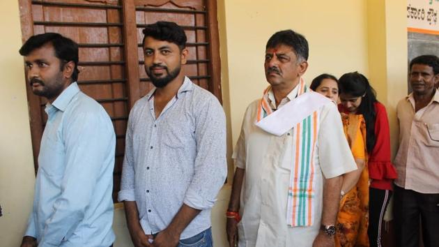 Karnataka elections: Minister DK Shivakumar at a polling booth in Kanakapura on Saturday.(HT Photo)