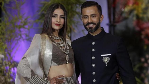 Sonam Kapoor poses with husband Anand Ahuja at their wedding reception in Mumbai. (PTI) Sonam Kapoor poses with husband Anand Ahuja at their wedding reception in Mumbai. (PTI)