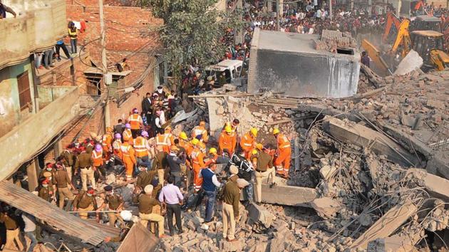 As many as 16 people, including nine firefighters, had died after the plastic factory near Suffiyan Chowk collapsed after catching fire on November 20 last year.(HT File)