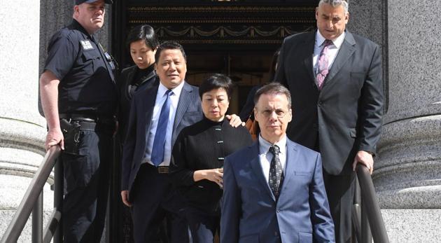 Billionaire Ng Lap Seng, chairman of Sun Kian Ip Group, third left, exits from federal court in New York on May 11, 2018. (Bloomberg) Billionaire Ng Lap Seng, chairman of Sun Kian Ip Group, third left, exits from federal court in New York on May 11, 2018. (Bloomberg)