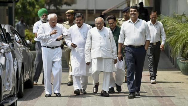 Congress leaders Kapil Sibal, Motilal Vora, RPN Singh and others leave after a meeting with Election Commissioner of India at Nirvachan Sadan in New Delhi on Friday. The Congress on Friday petitioned the Election Commission demanding that BJP candidate B Sriramulu be disqualified from contesting the Karnataka assembly election over a ‘sting’ video allegedly showing him trying to a bribe a former chief justice of India’s relative. (PTI) Congress leaders Kapil Sibal, Motilal Vora, RPN Singh and others leave after a meeting with Election Commissioner of India at Nirvachan Sadan in New Delhi on Friday. The Congress on Friday petitioned the Election Commission demanding that BJP candidate B Sriramulu be disqualified from contesting the Karnataka assembly election over a ‘sting’ video allegedly showing him trying to a bribe a former chief justice of India’s relative. (PTI)
