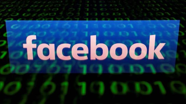 In this file photo illustration picture taken on April 29, 2018, the logo of social network Facebook is displayed on a screen and reflected on a tablet in Paris.(AFP)
