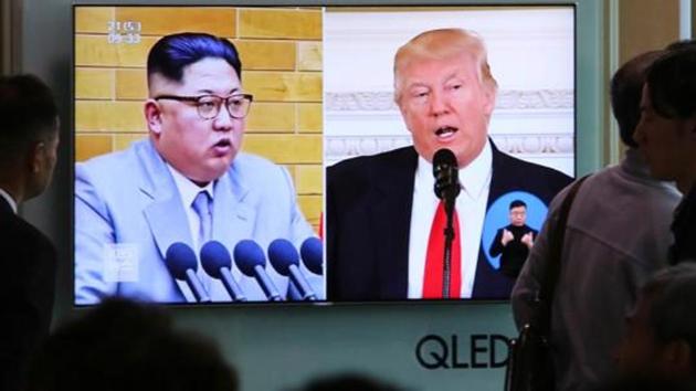 In this April 21, 2018 file photo, People watch a TV screen showing file footage of US President Donald Trump, right, and North Korean leader Kim Jong Un during a news programme at the Seoul Railway Station in Seoul, South Korea. (AP File) In this April 21, 2018 file photo, People watch a TV screen showing file footage of US President Donald Trump, right, and North Korean leader Kim Jong Un during a news programme at the Seoul Railway Station in Seoul, South Korea. (AP File)