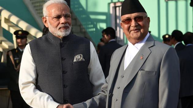 Nepali Prime Minister KP Sharma Oli greets Prime Minister Narendra Modi during a guard of honour in Kathmandu on May 11, 2018. (AFP) Nepali Prime Minister KP Sharma Oli greets Prime Minister Narendra Modi during a guard of honour in Kathmandu on May 11, 2018. (AFP)