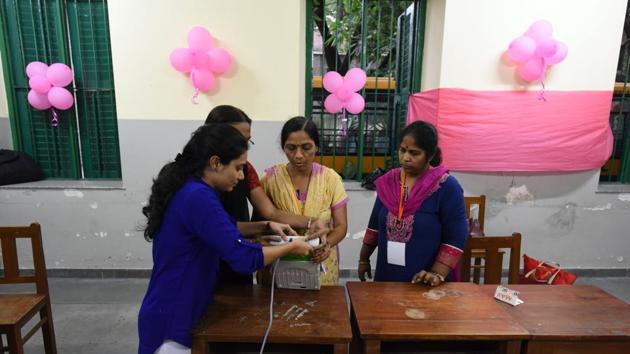 Karnataka elections: Polling staff setting up the Pink Booth at Bishop Cotton Girls school in Bengaluru. (Arijit Sen/HT Photo) Karnataka elections: Polling staff setting up the Pink Booth at Bishop Cotton Girls school in Bengaluru. (Arijit Sen/HT Photo)